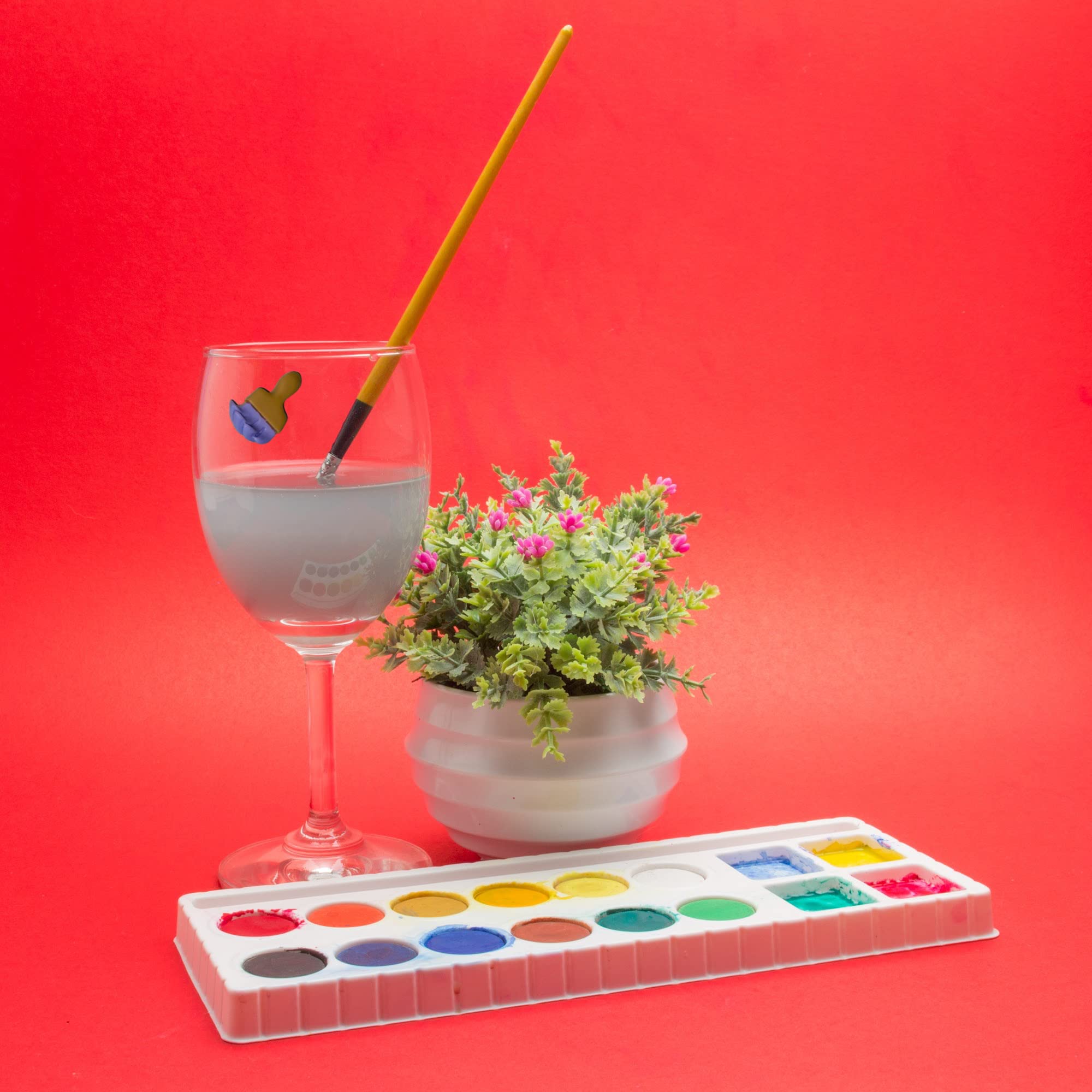 Colorful paint brush and palette charm markers