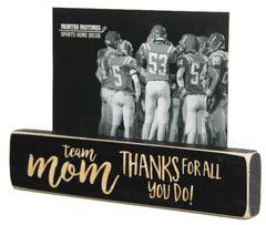 Painted Pastimes team mom photo display sign on desk