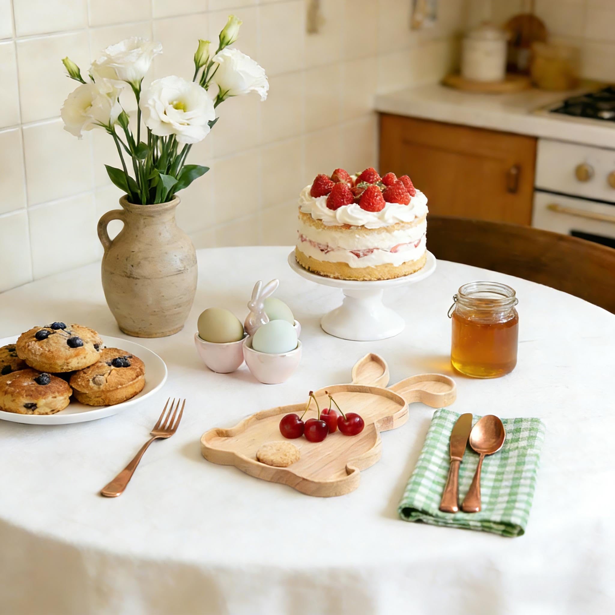 Party snacks and fruit arranged on wooden tray