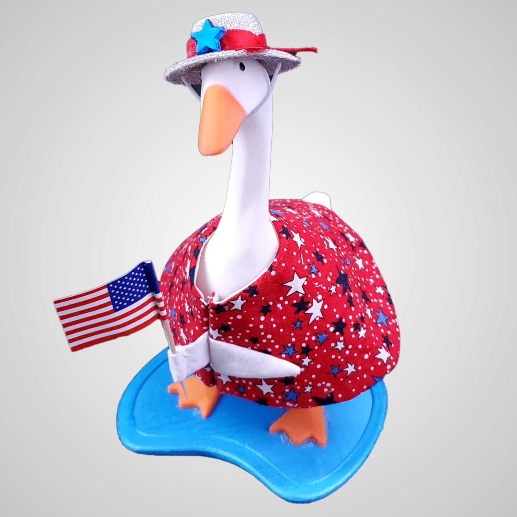Red white blue star dress with American Flag included on desk goose