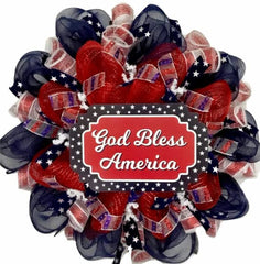 Patriotic wreath with God Bless America wood sign center