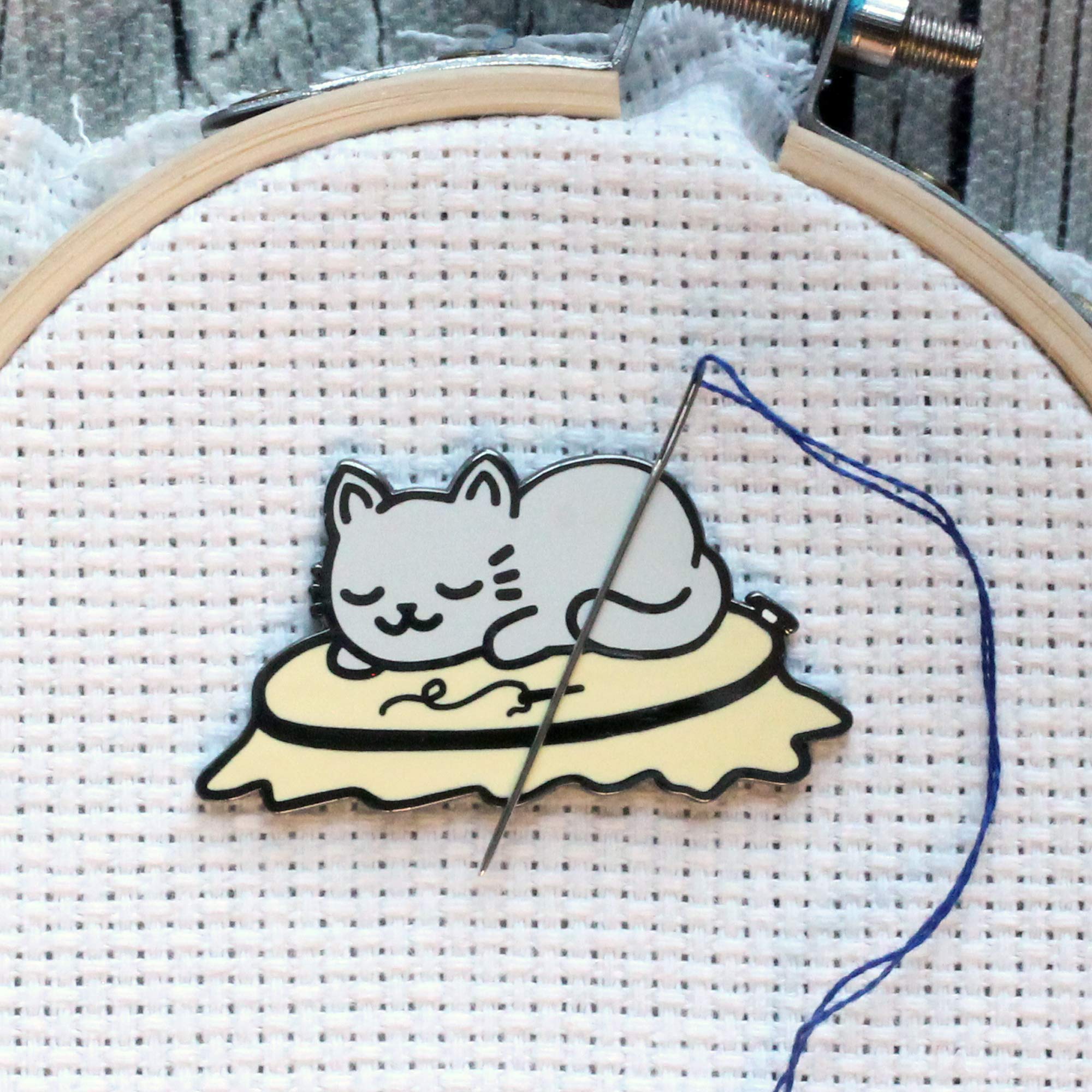 Pattern holder magnet function of the needle minder