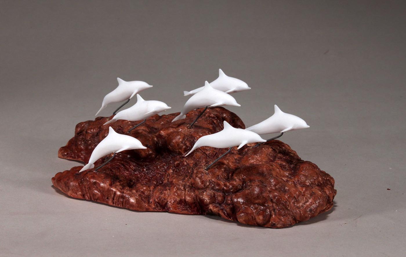Signed John Perry sculpture with Pellucida dolphins