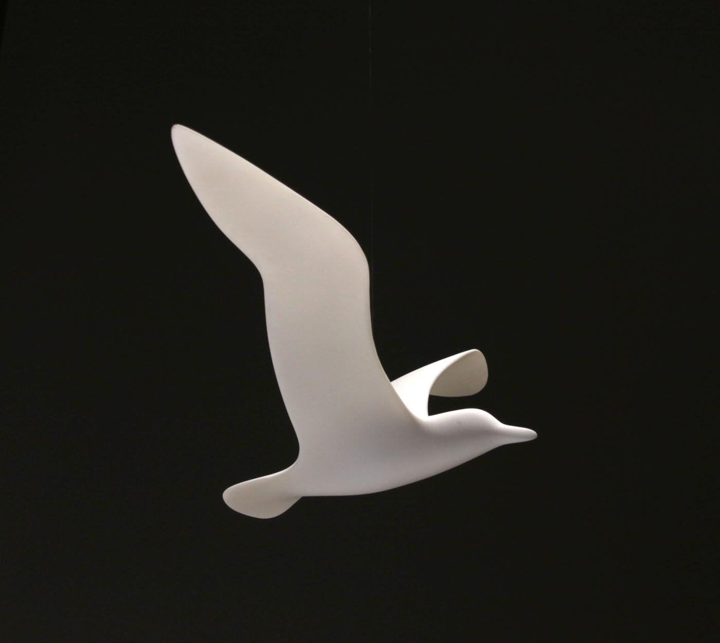 Seagull sculpture hanging on monofilament line
