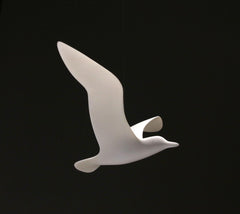 Seagull sculpture hanging on monofilament line