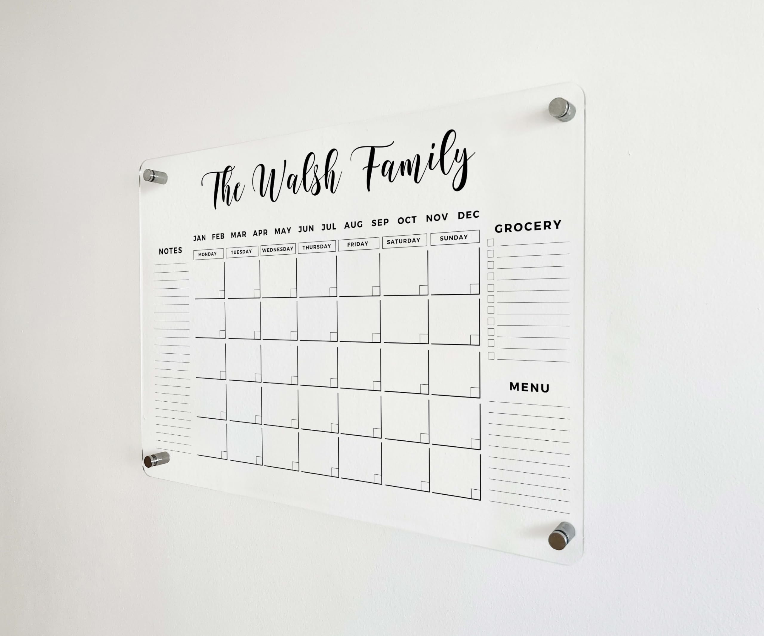 Personalized 2026 calendar on acrylic surface