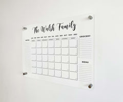 Personalized 2026 calendar on acrylic surface