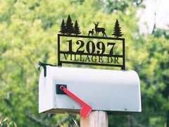 Personalized metal mailbox address sign showing house number