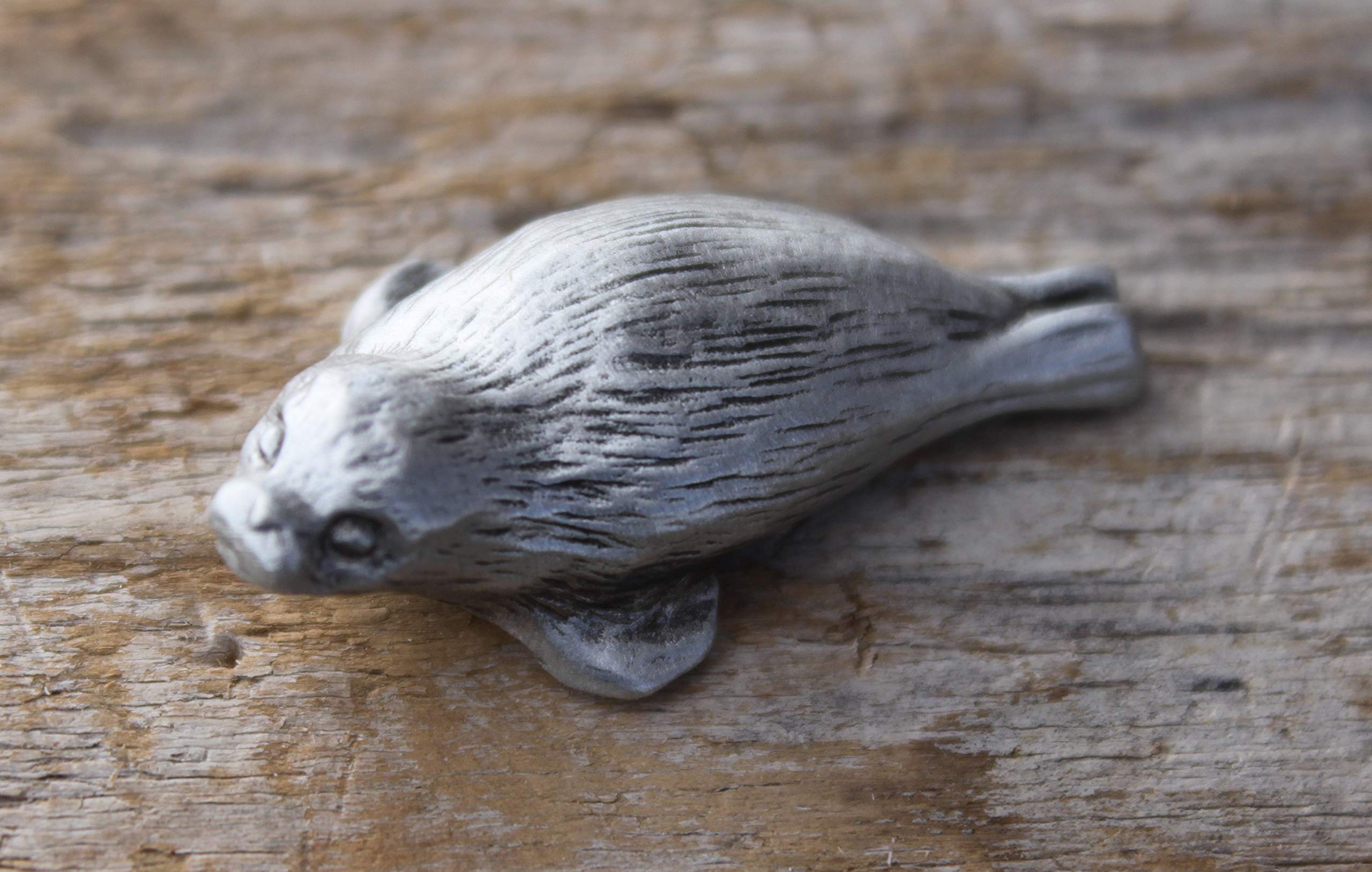 Small pewter seal pup figurine about 1 1/4 inch long