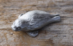 Small pewter seal pup figurine about 1 1/4 inch long