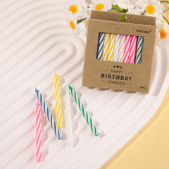 Assorted blue white yellow pink and green spiral birthday candles