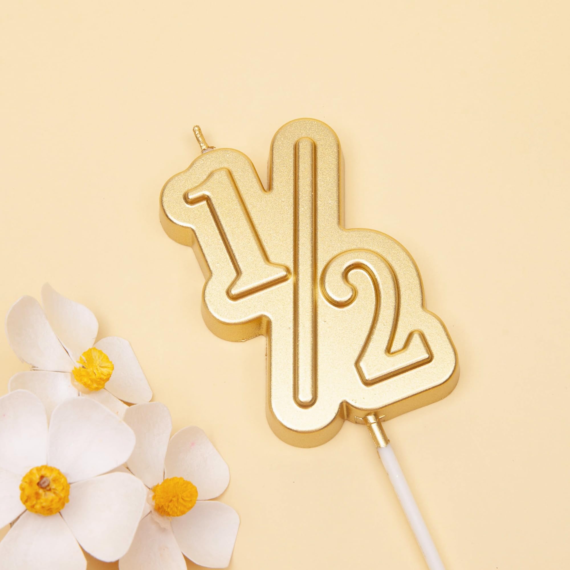 Gold number birthday candle for milestone celebrations