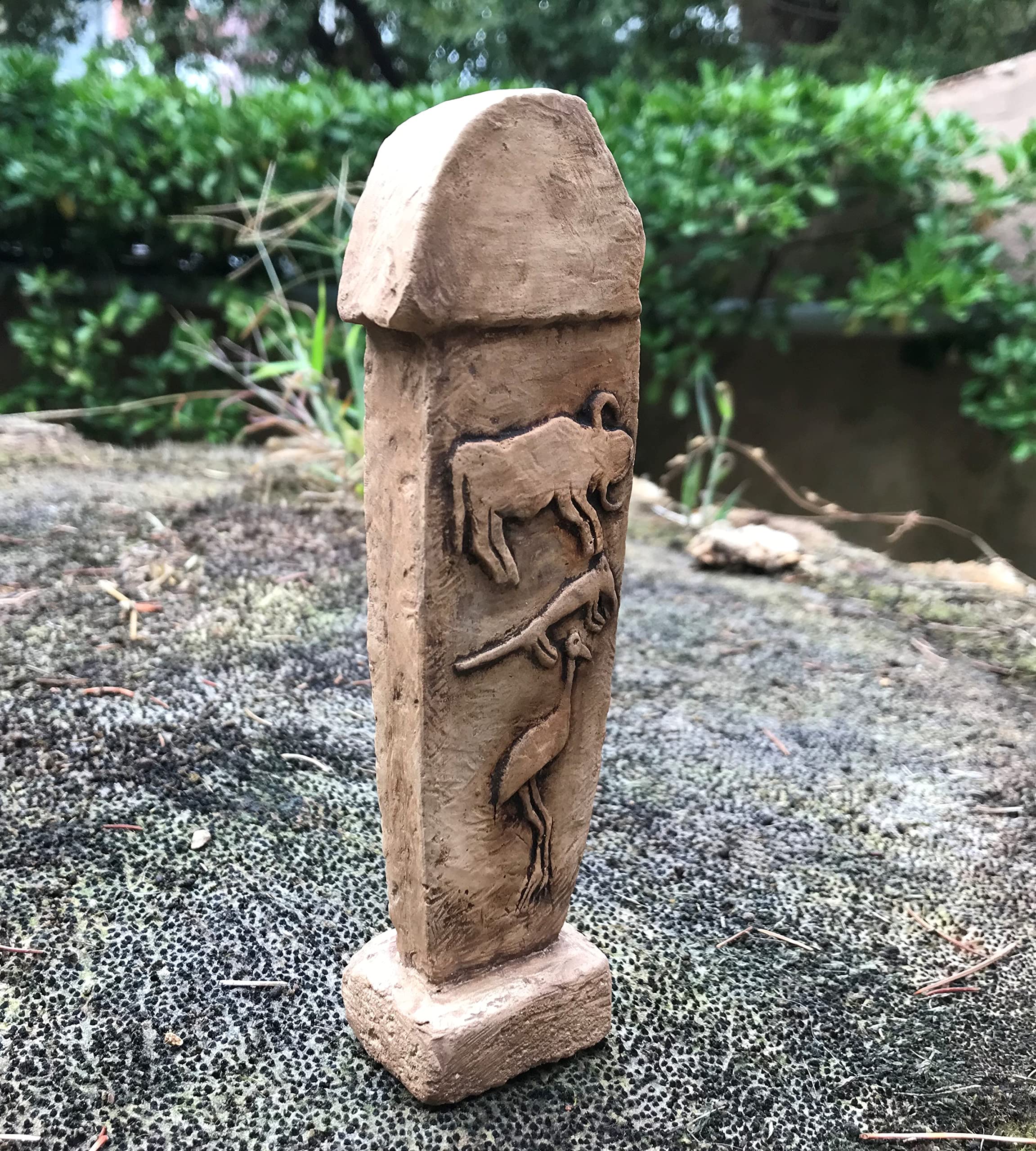 Rustic brown ceramic Gobeklitepe art statue for display