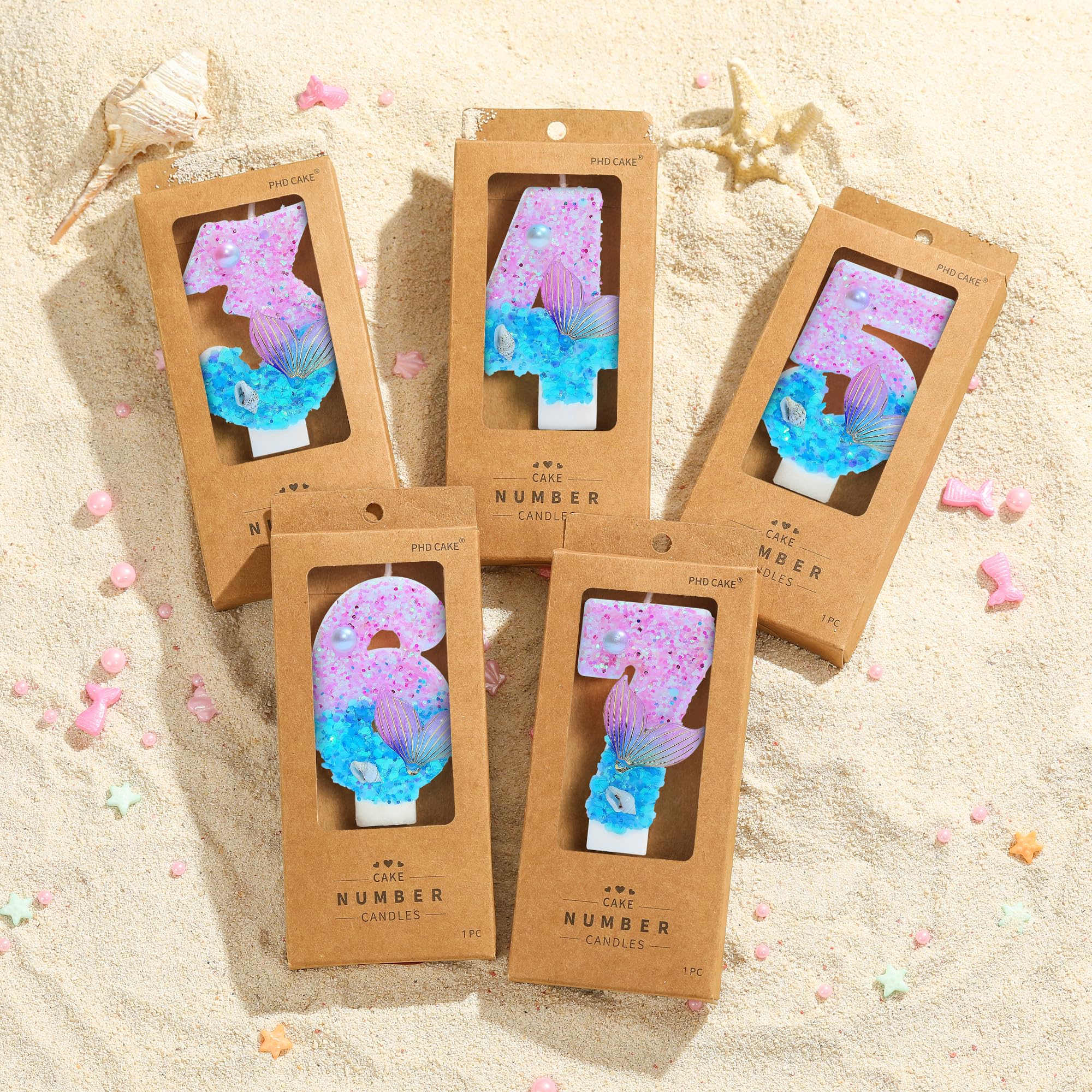 Pink blue mermaid birthday candle on cake