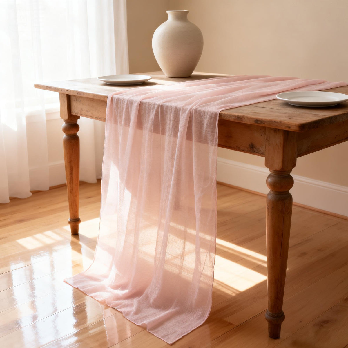 Two-piece pink cheesecloth table runner 33x120 inches suitable for weddings