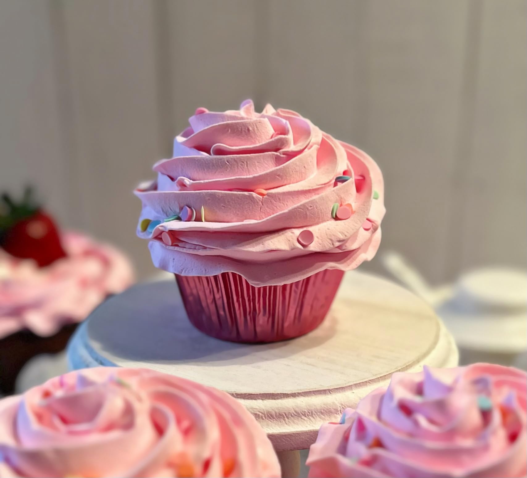 Set of 3 fake cupcakes on display for decor