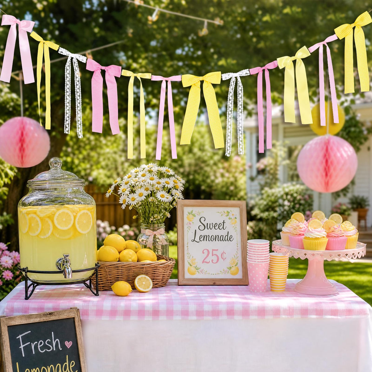 Close up of Pink Lemon Yellow Ribbon Bow Garland ribbons on pink and lemon palette