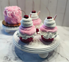 Pink milkshake cupcake size 3.5 inches wide by 5 inches tall including the cherry