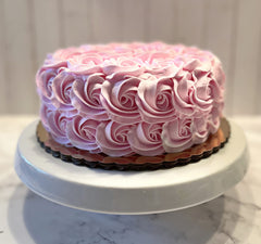 9 inch wide by 4 inch tall fake cake on a 10 inch cake board