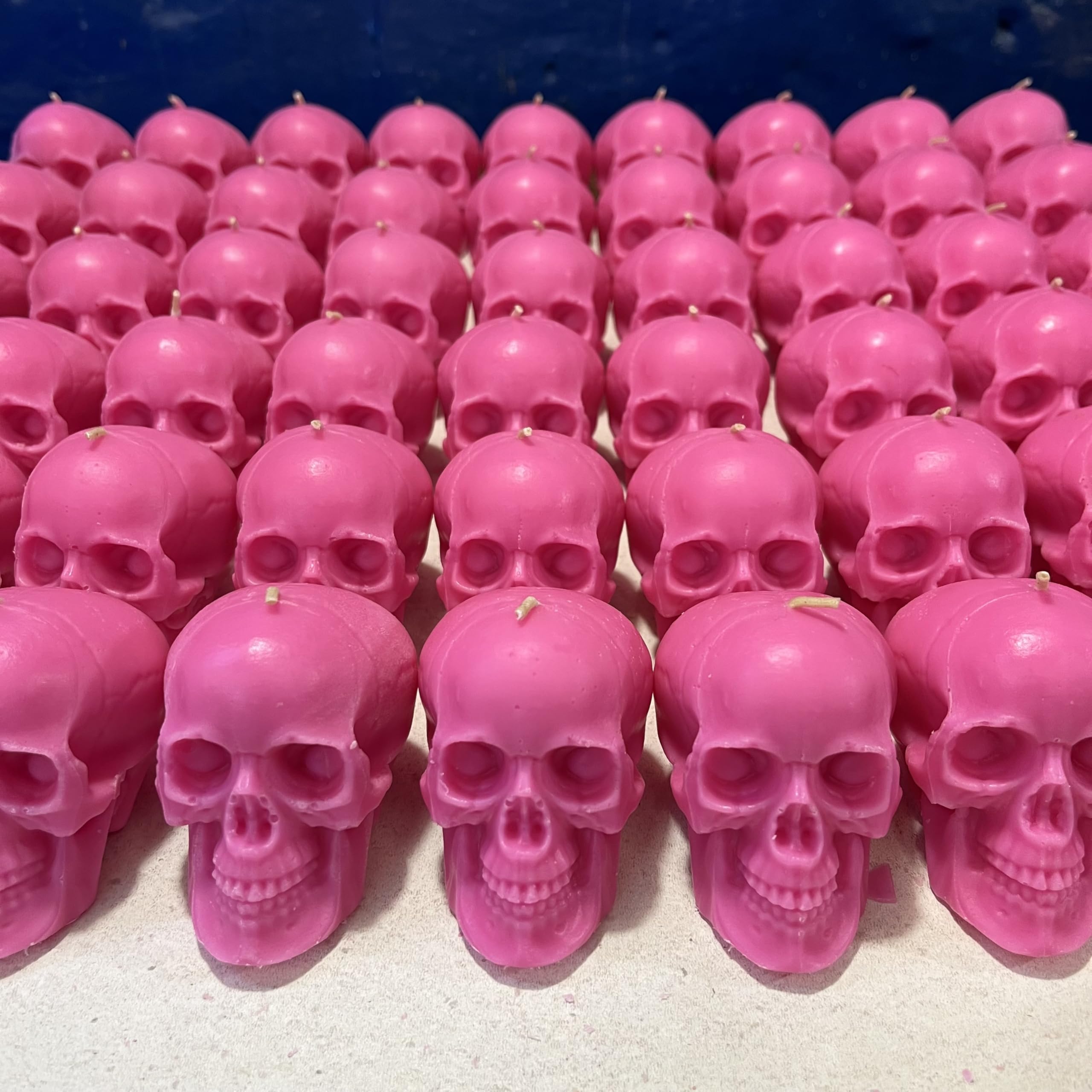 Pink skull candles for decorations and fireplace display