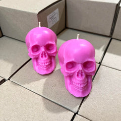 Pair of pink skull candles for love and intention setting