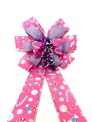 Purple glitter ribbon detail on Pink Whimsy Candy Bow
