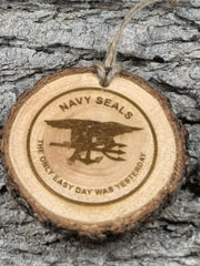 Pinon wood ornament featuring Navy Seal Logo burn detail
