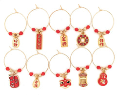 Red and gold enamel Chinese symbol charms