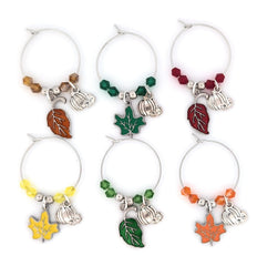 Pixie autumn glass markers leaf charms pumpkins closeup on stemware