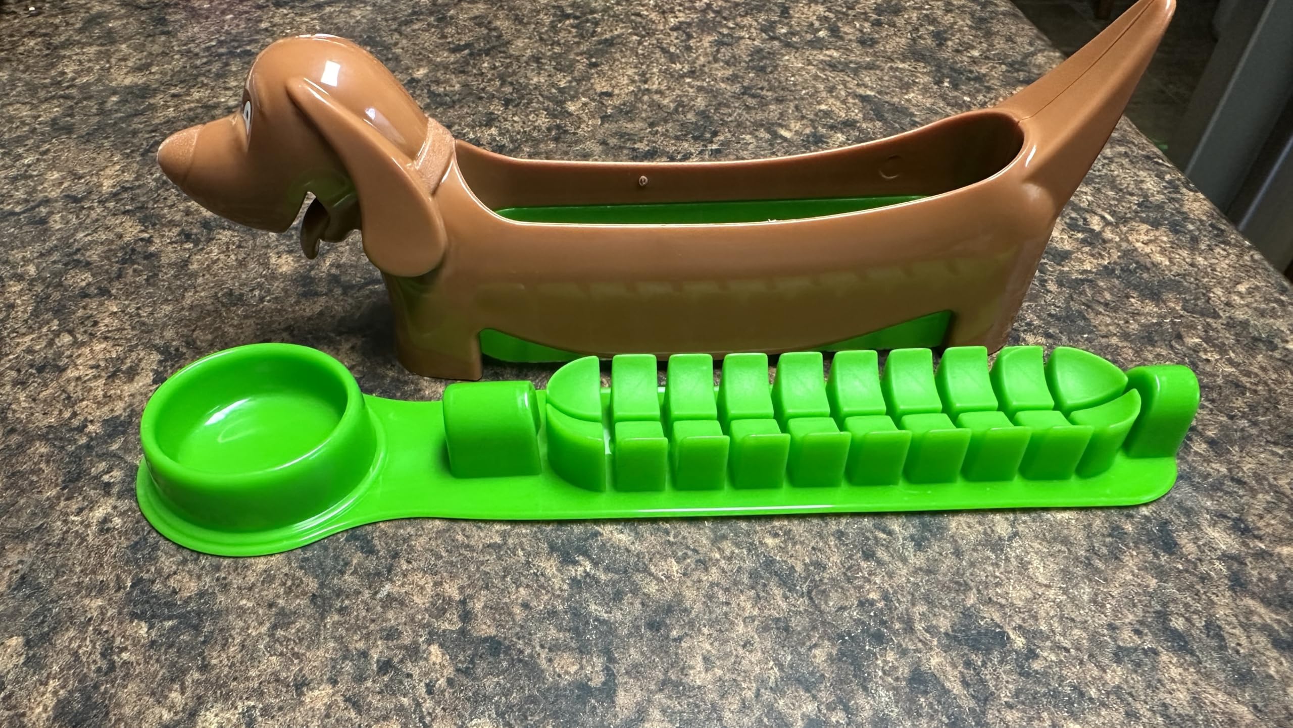 Slicer creates small pieces of hotdog image