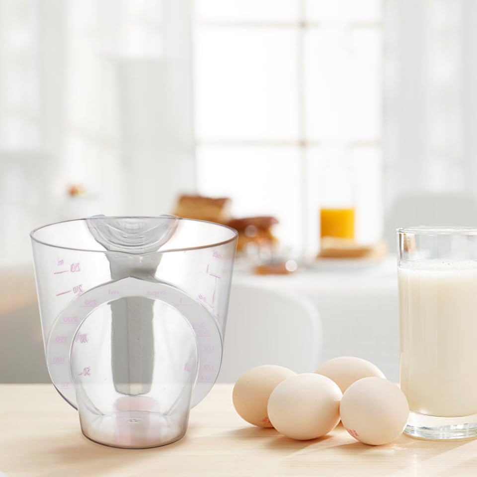 Assorted color plastic measuring cup with clear markings