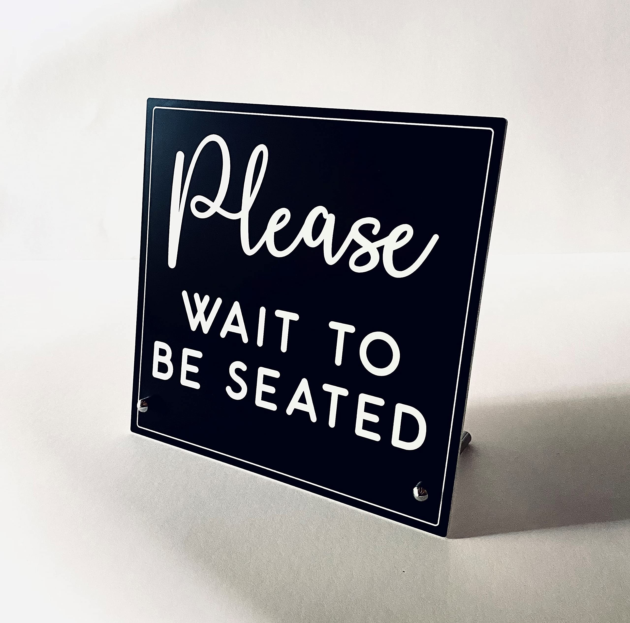 Black and white Please Wait To Be Seated design for hostess stand
