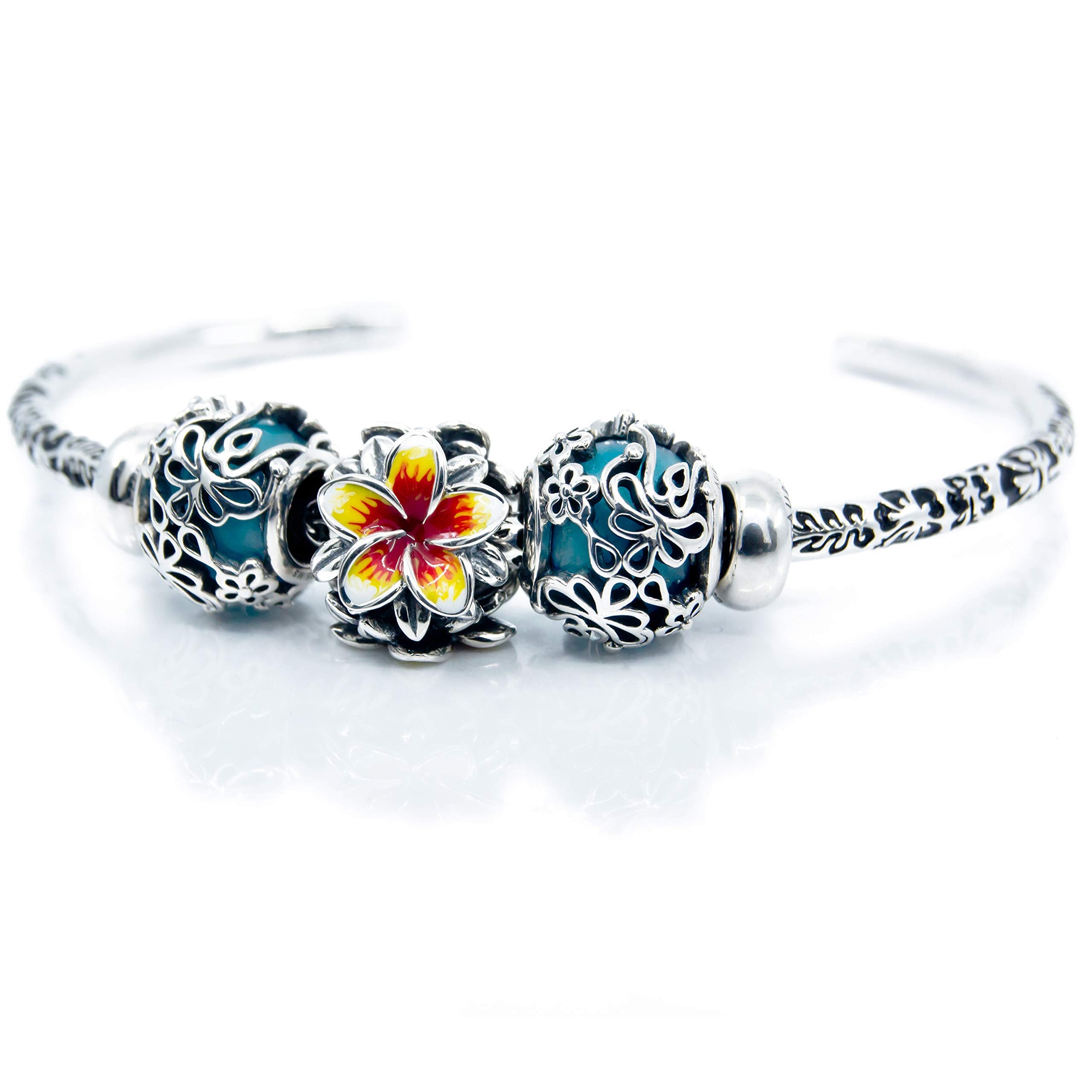Red enamel yellow Frangipani bead detail
