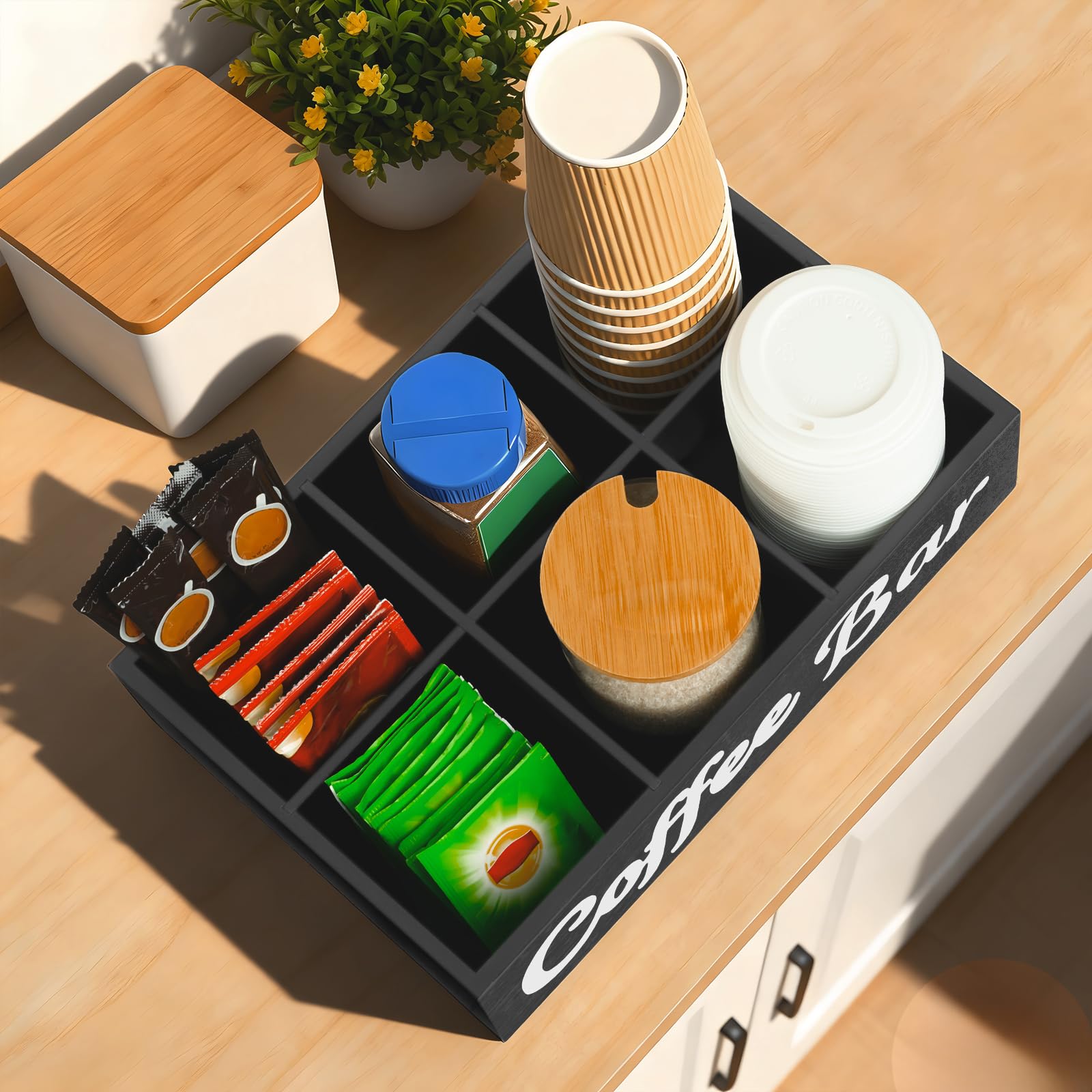 Pods sugar tea bags cups and syrups organized