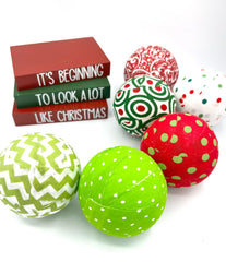 Set of six fabric-wrapped balls in lime green red white colors for holiday decor