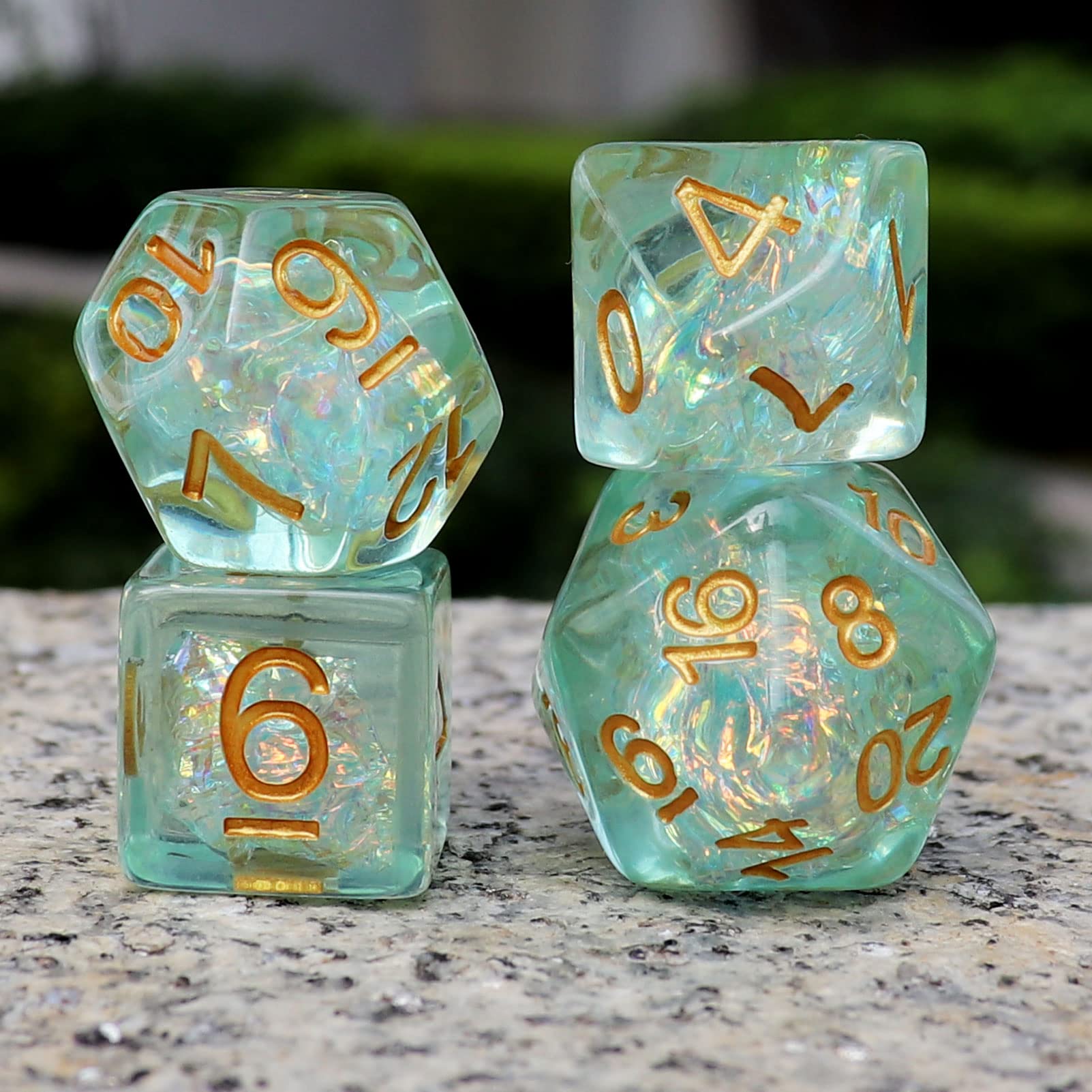 Iridescent mylar green inclusions in resin dice