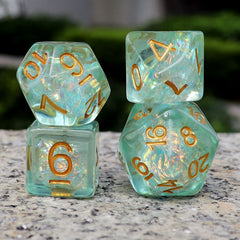 Iridescent mylar green inclusions in resin dice