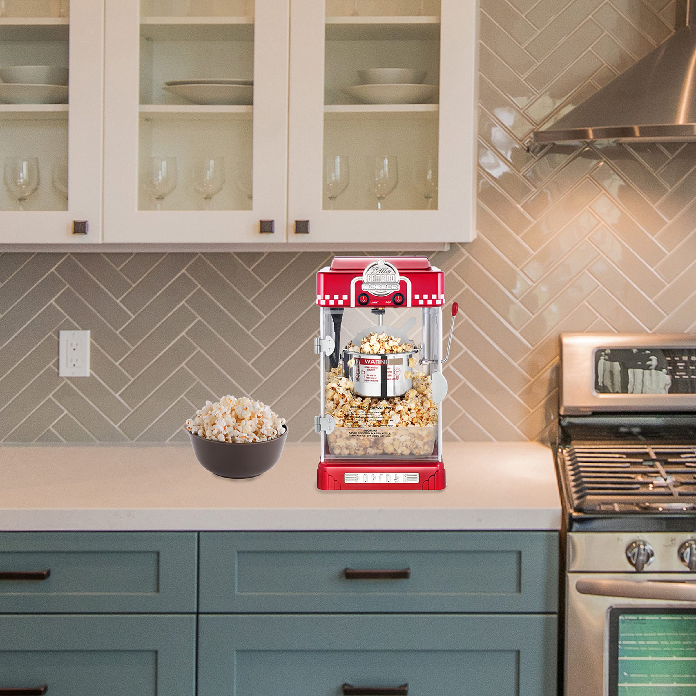 Popcorn machine showing heated deck and stainless-steel kettle