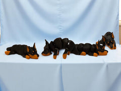 Doberman figurine set with articulated joints close-up