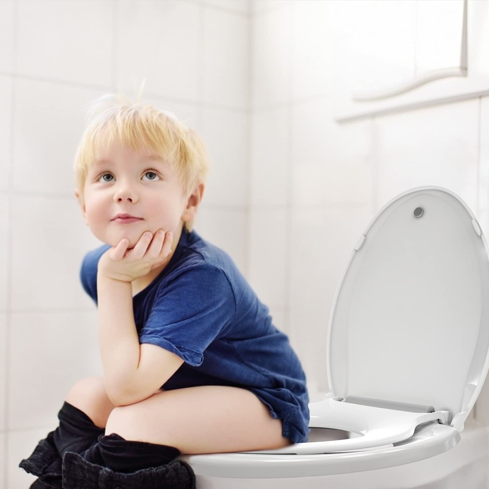 Potty training toilet seat with slow close feature
