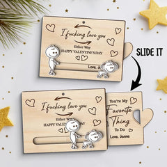 Pull-out slider mechanism shows surprise message on ornament