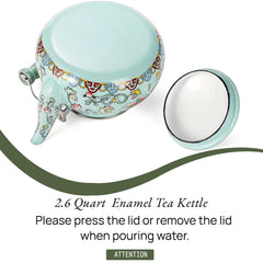 Close up of colorful floral enamel finish on steel kettle