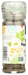 Pepper grinder dispensing ground pepper