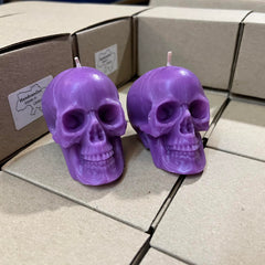 Purple skull candles for spiritual contact and divination