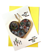 Quilling technique ornament with colorful recycled paper