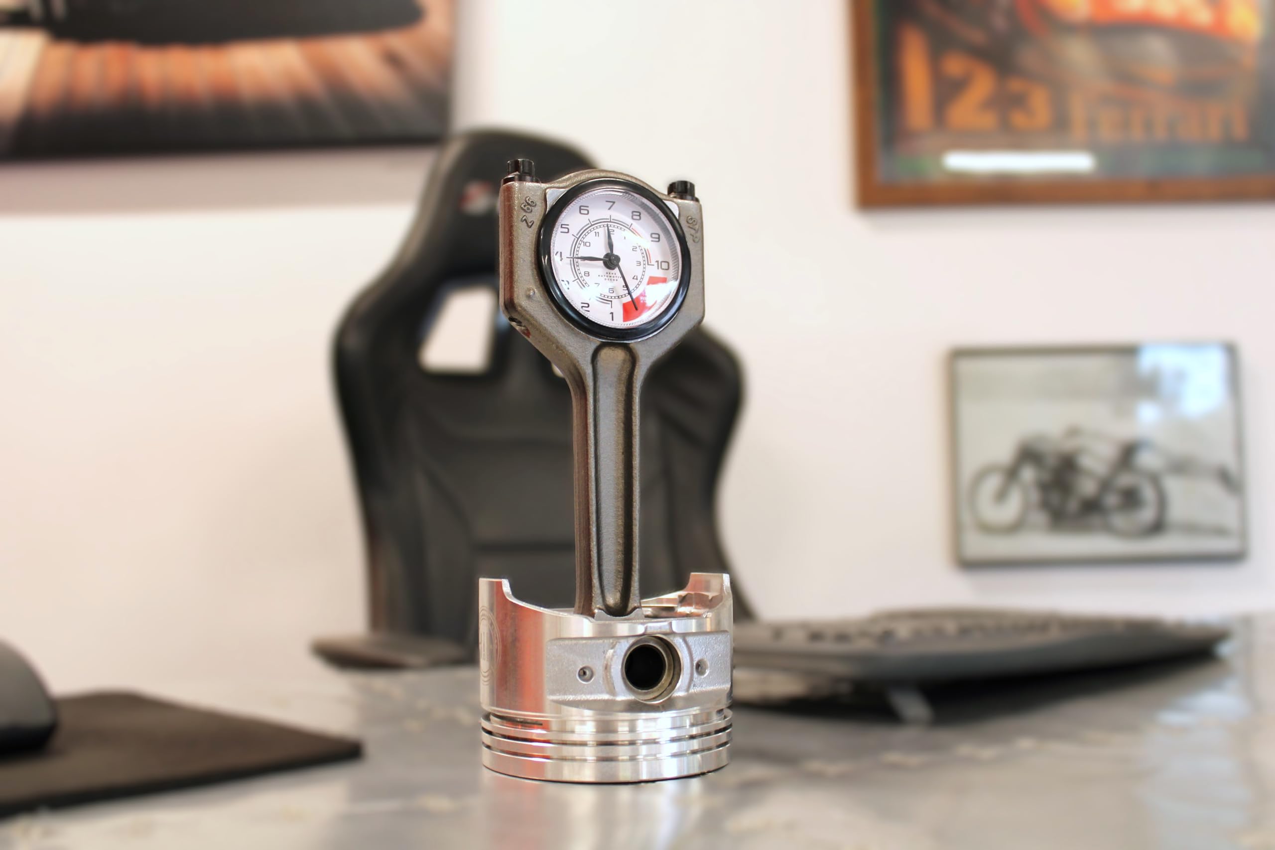 Polished piston clock with protective coating to stay shiny