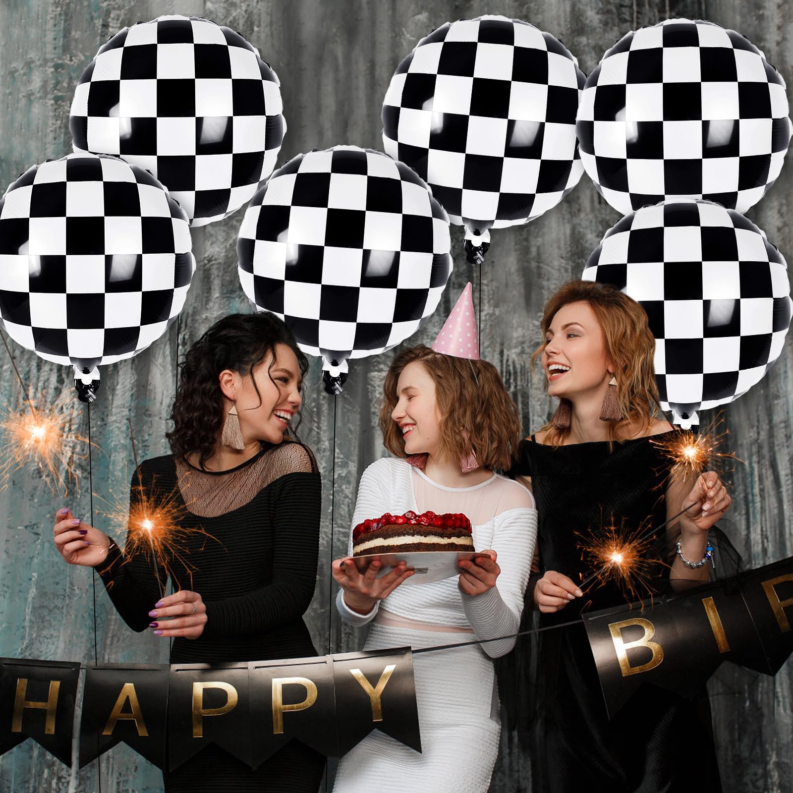 Race car party decor featuring black and white checkered balloons