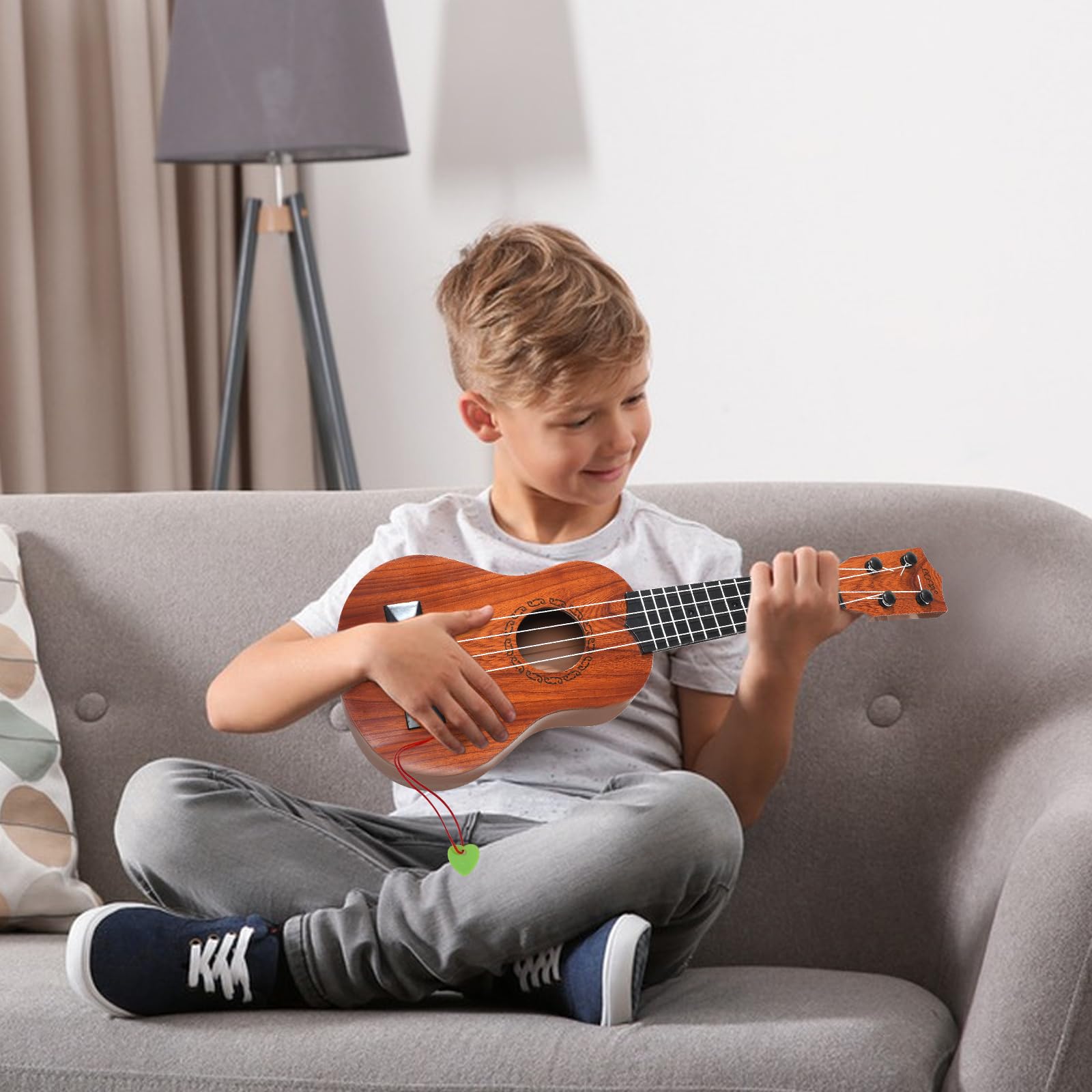 Raimy 4-string toy guitar for beginner musicians