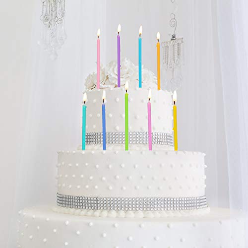Colorful rainbow cake candles displayed for cake decoration