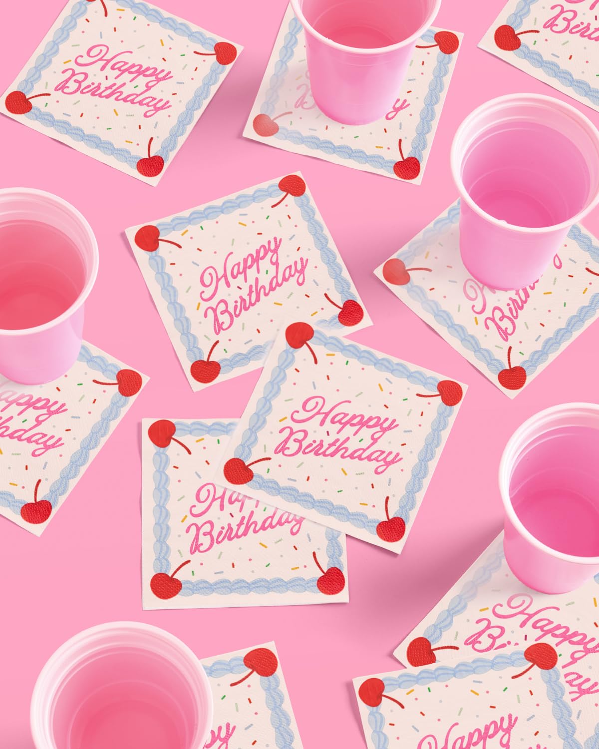 white napkins with birthday script blue icing border for celebrations